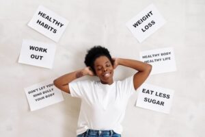 Person outdoors reflecting healthy daily habits for energy and wellbeing